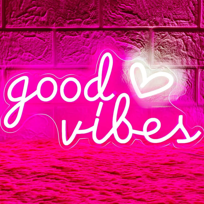 16"x8" heart-shaped led neon sign with 'good vibes' text and a white heart accent