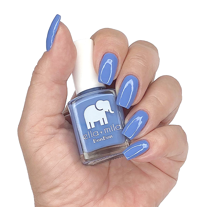 Life's a Beach periwinkle blue nail polish manicure on a light skin tone with the bottle