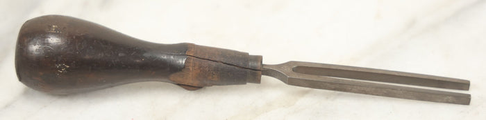 Lot 105 - Grouping Of Four Antique Musical Items Including Two Tuning Forks, Whistle, And Mouth Harp