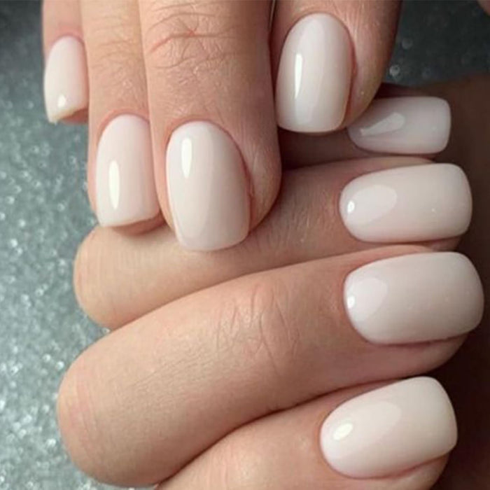 dual attachment system: nail glue for long wear and jelly adhesive tabs for damage-free reuse